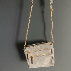 Gray crossbody bag with gold finish